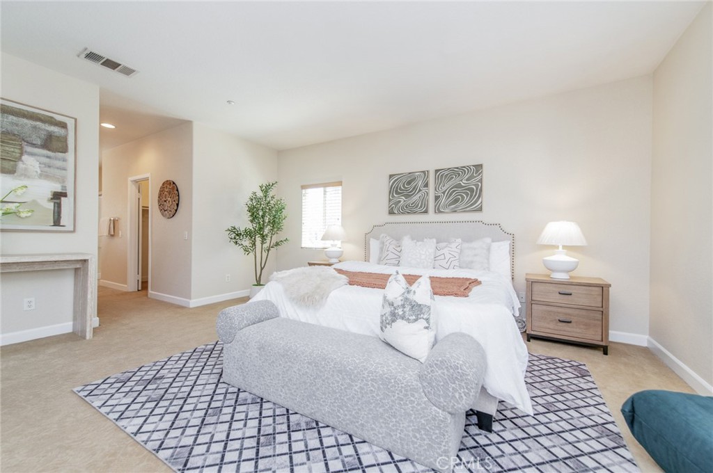 4947 Plumtree Court Riverside, CA 92504 - Photo 24 of 46 the luxurious primary suite serves as a private retreat