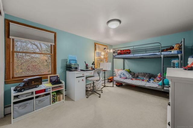 a children room with toys and white walls