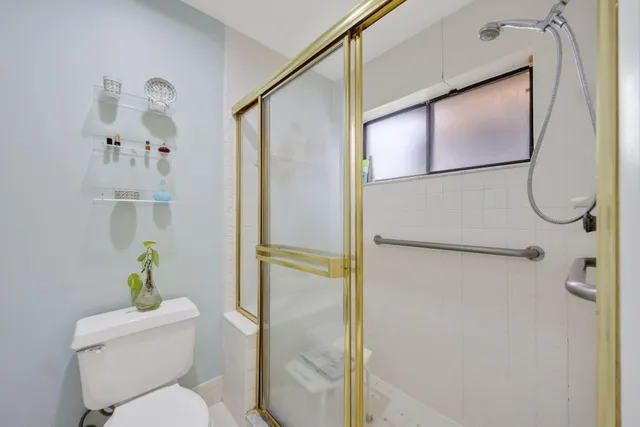 a bathroom with a shower curtain