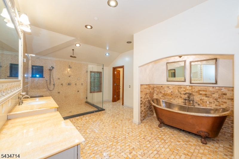 50 Rock Spring Road West Orange, NJ 07052 - Photo 34 of 50 a spacious bathroom with a tub and shower
