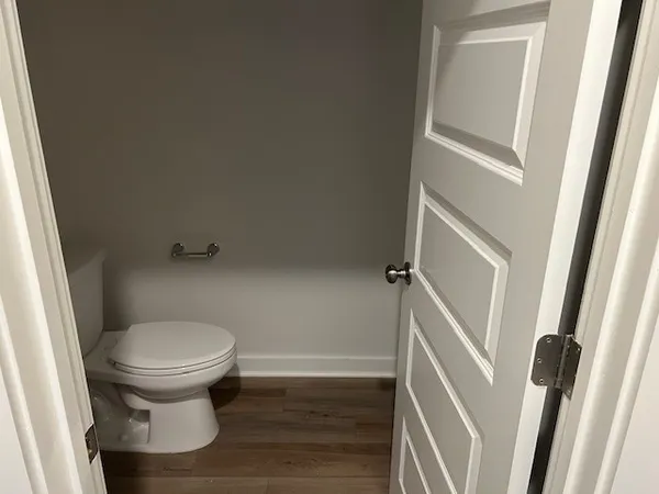 a bathroom with a toilet and a sink