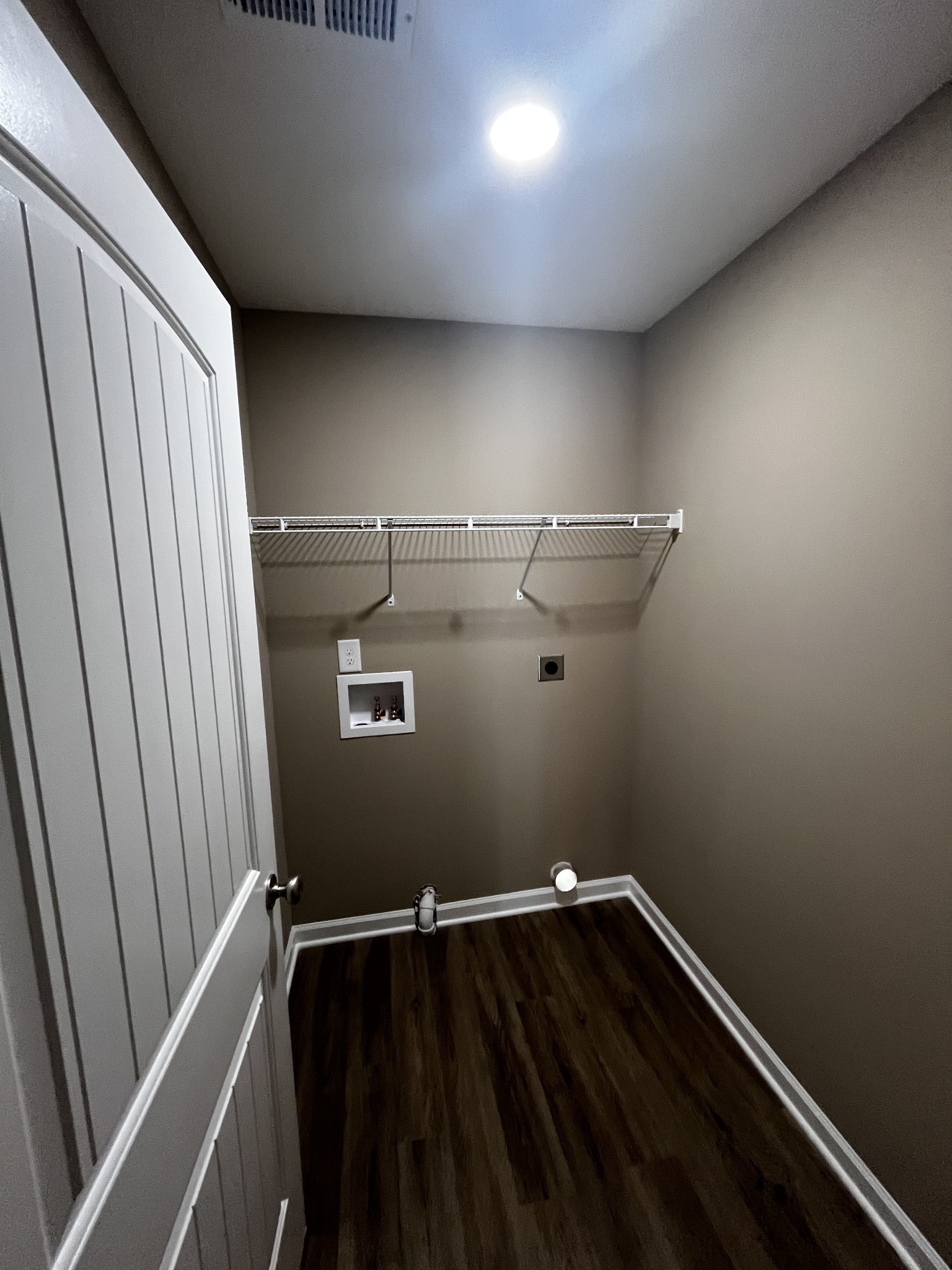 209 Thomas Street Tullahoma, TN 37388 - Photo 4 of 8 a view of a room with racks on the wall