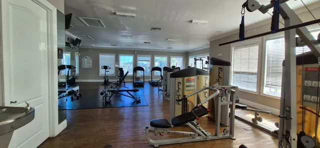 a view of a swimming pool with a patio