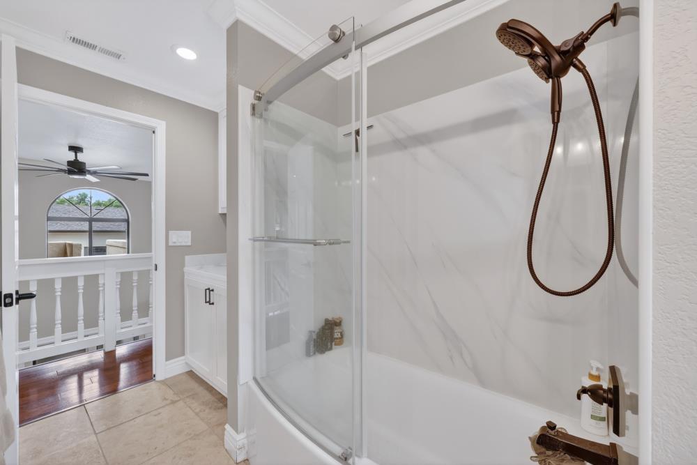3340 Garden Bar Road Lincoln, CA 95648 - Photo 29 of 56 a bathroom with a shower a mirror and a shower