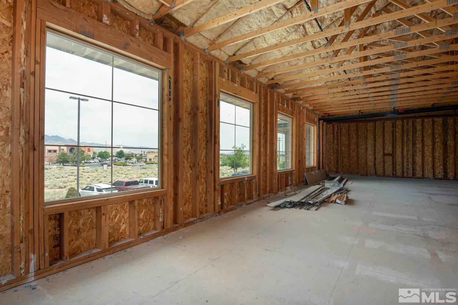 5 Pine Cone Road, Unit 203 Dayton, NV 89403 - Photo 11 of 11 an empty room with windows