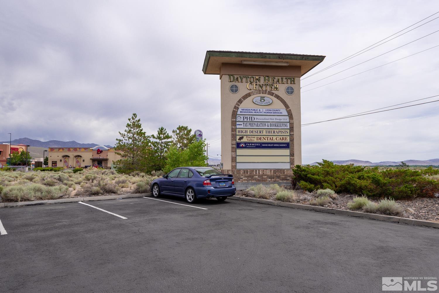 5 Pine Cone Road, Unit 203 Dayton, NV 89403 - Photo 5 of 11 a car parked on the side of the road
