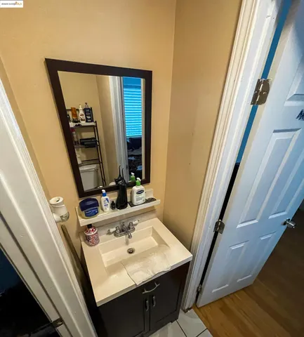 a bathroom with a toilet and a sink