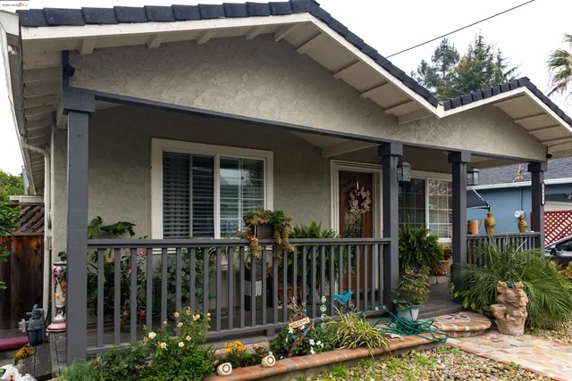 a front view of house and yard with green space