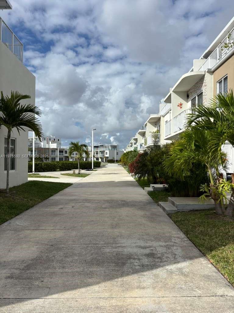 13900 Southwest 259th Street Homestead, FL 33032 - Photo 19 of 23 a view of building with yard