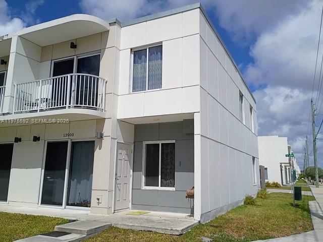 13900 Southwest 259th Street Homestead, FL 33032 - Photo 2 of 23 a view of small house with a yard