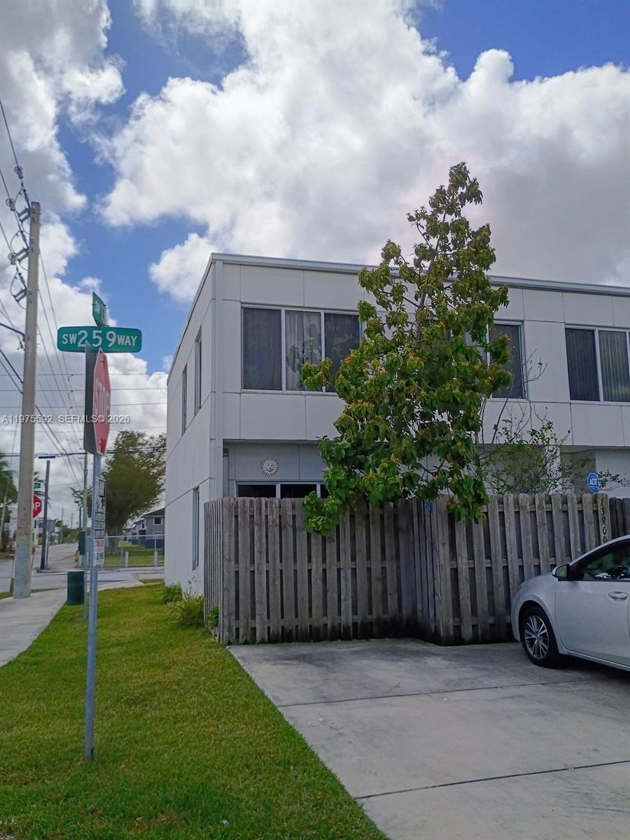 13900 Southwest 259th Street Homestead, FL 33032 - Photo 23 of 23 a view of a car parked in front of a house