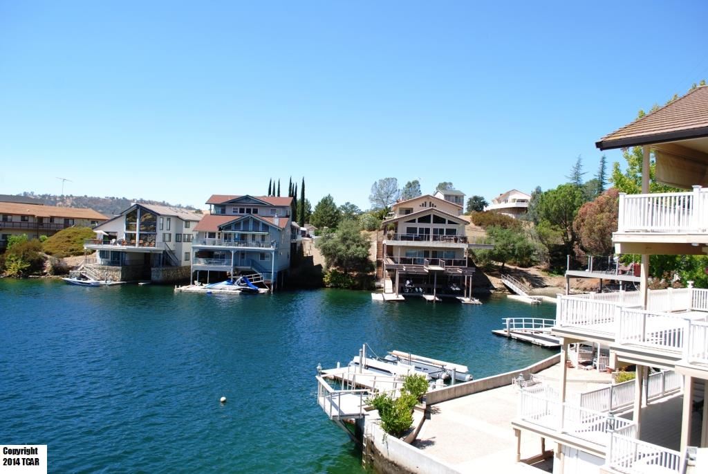 796 Mother Shipton Road Copperopolis, CA 95228 - Photo 17 of 24 a view of a lake with boats and trees
