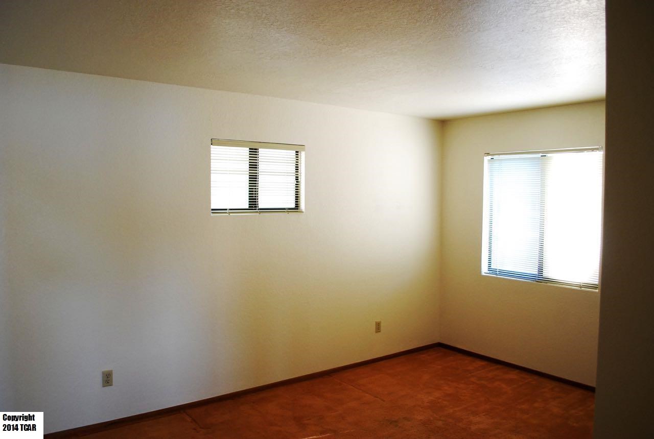 796 Mother Shipton Road Copperopolis, CA 95228 - Photo 23 of 24 an empty room with a window