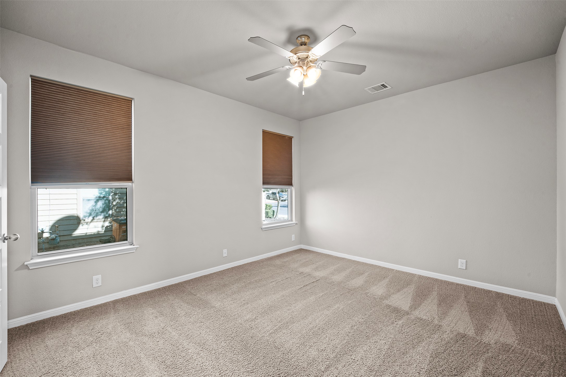 7233 Menchaca Road, Unit 2 Austin, TX 78745 - Photo 16 of 34 a view of an empty room with a window