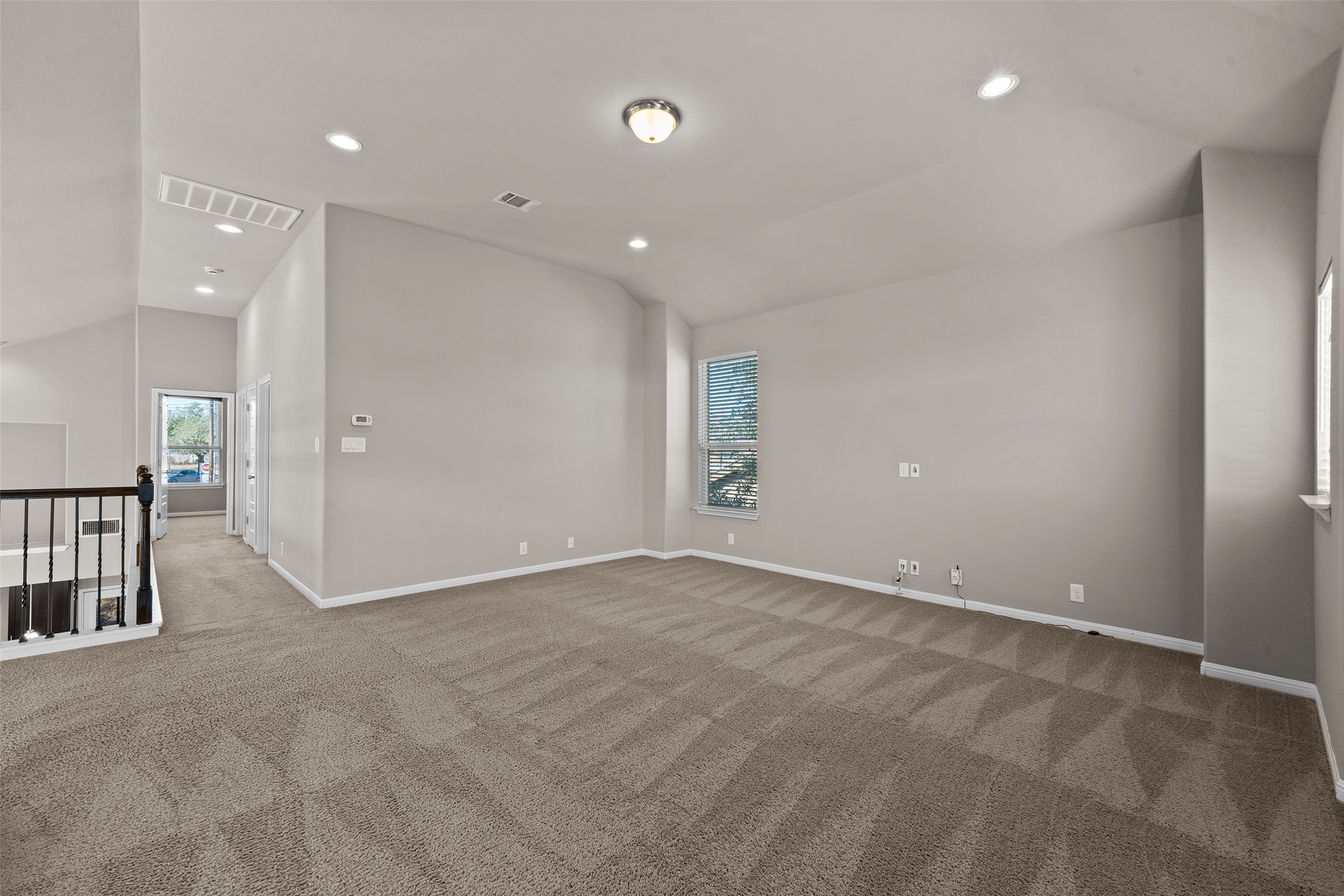 7233 Menchaca Road, Unit 2 Austin, TX 78745 - Photo 20 of 34 an empty room with entrance and windows