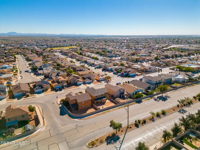 an aerial view of residential building with outdoor space