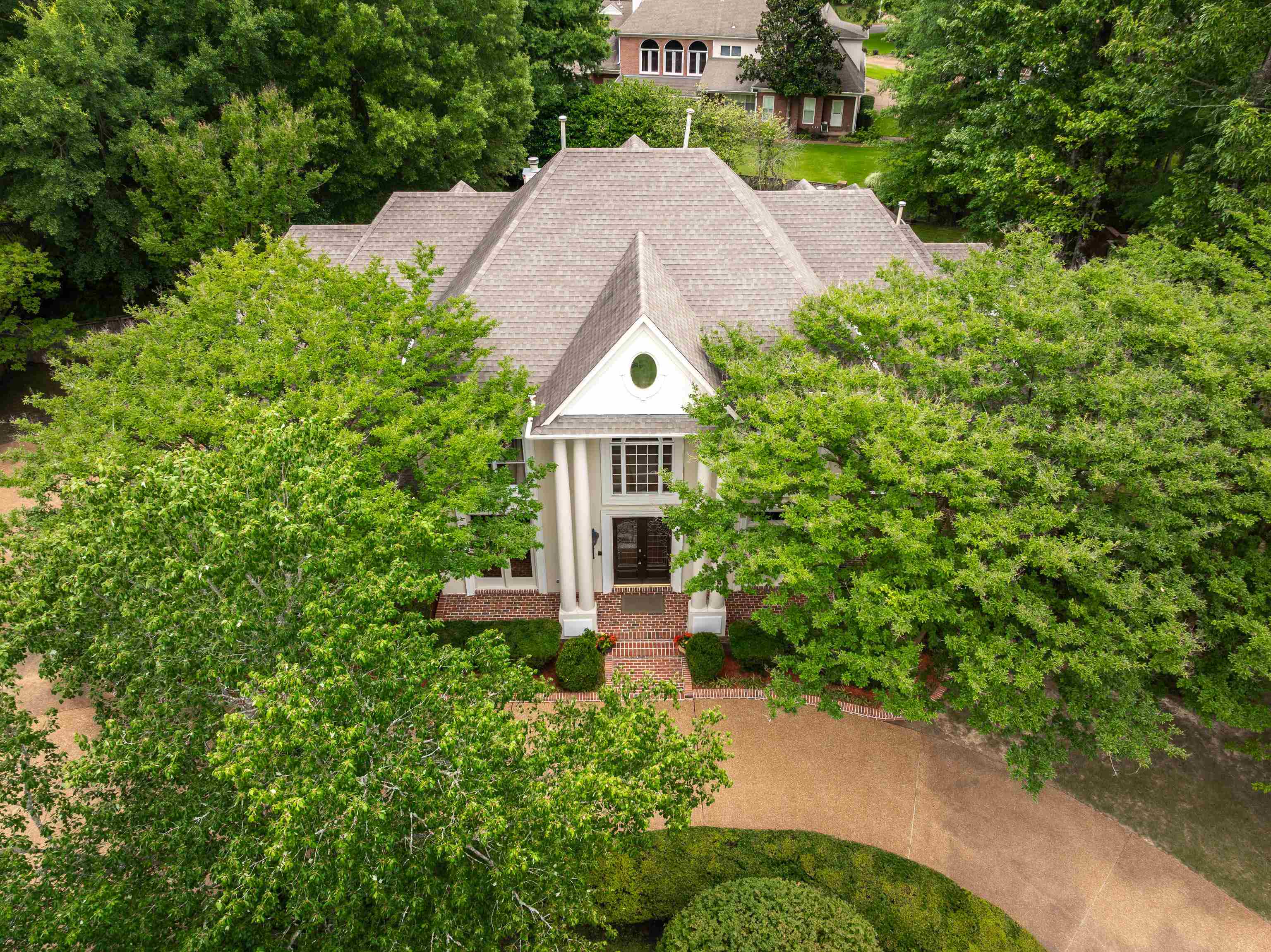 350 Bluff Ridge Cove Memphis, TN 38018 - Photo 6 of 37 Traditional-style residence featuring a prominent front entrance with tall columns
