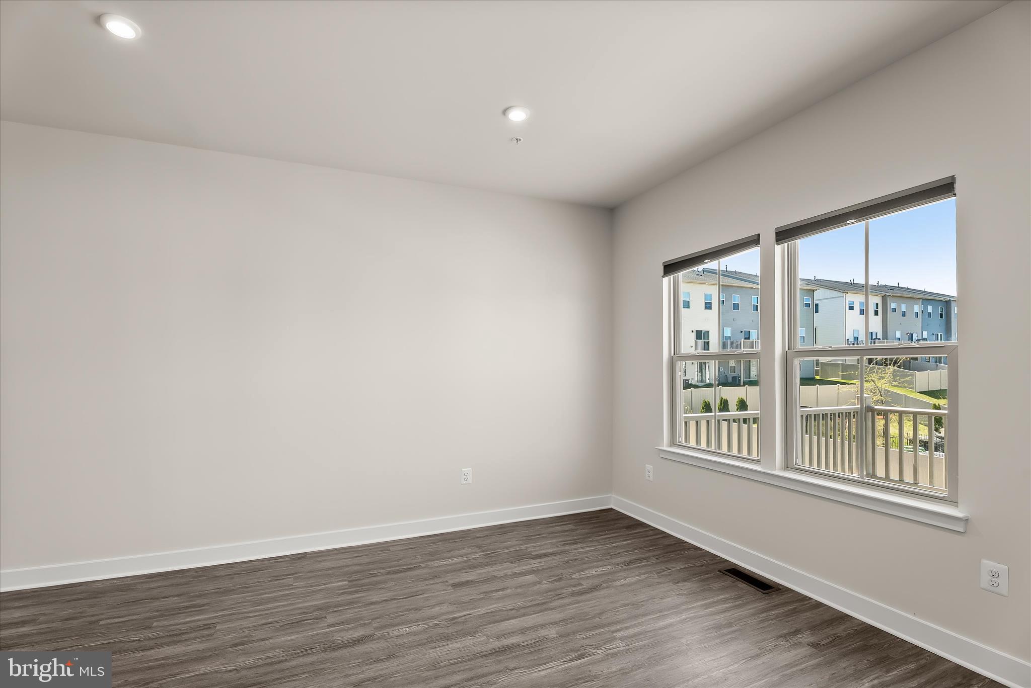 6072 Fallfish Court New Market, MD 21774 - Photo 20 of 78 wooden floor in an empty room with a window