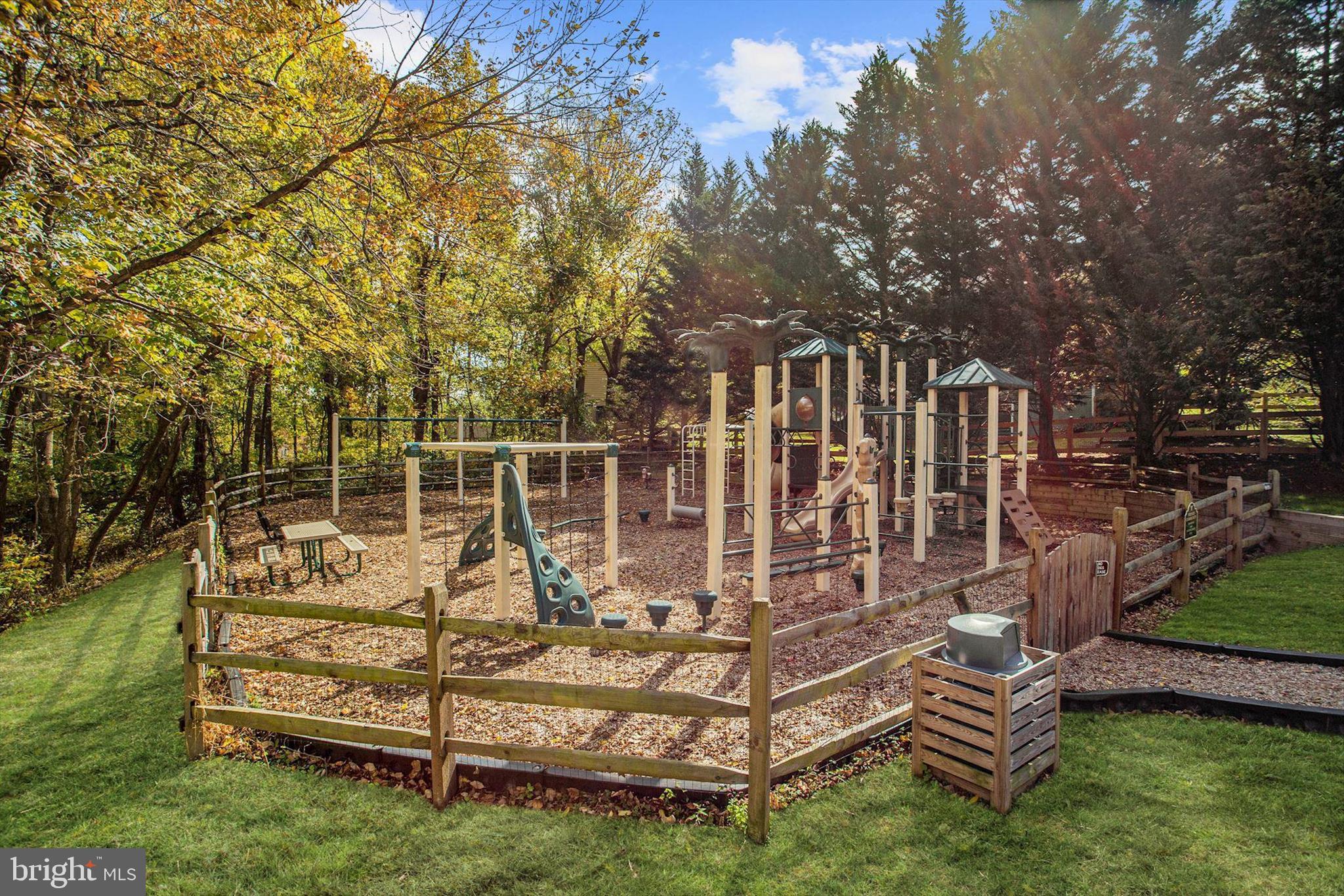 6072 Fallfish Court New Market, MD 21774 - Photo 71 of 78 a view of a wooden deck with a yard