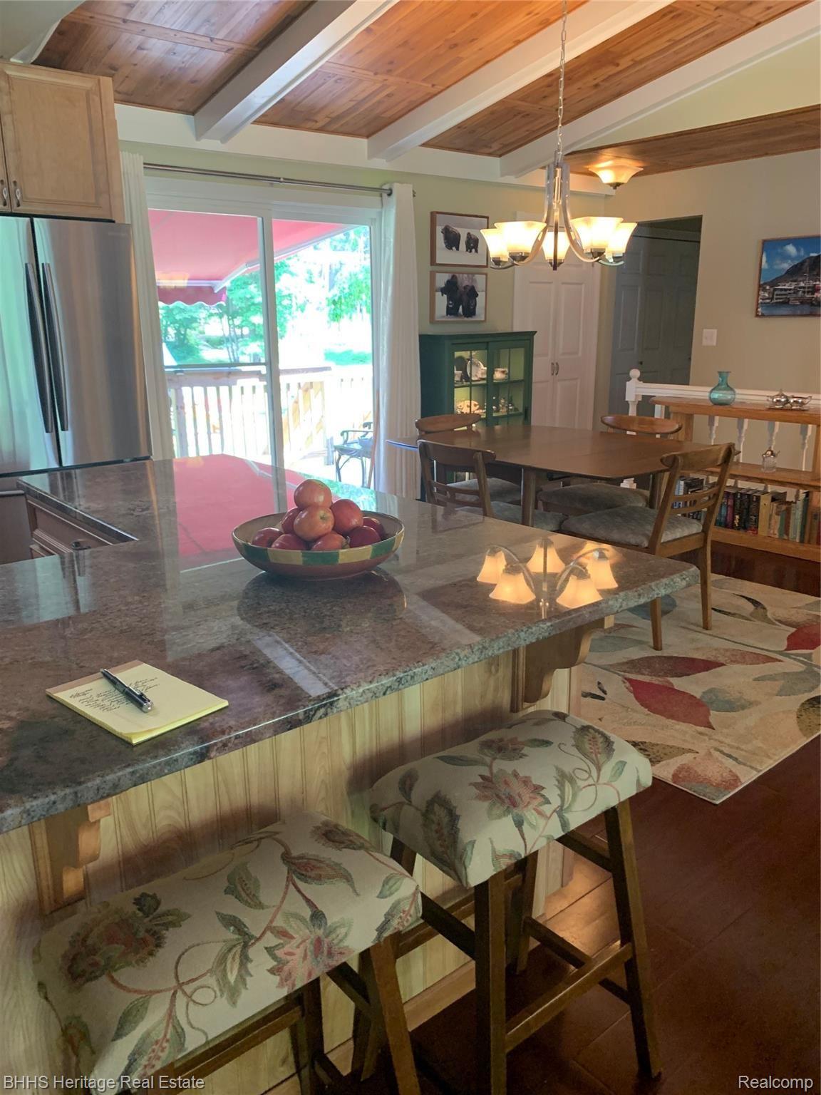 2413 Hunter Road Brighton, MI 48114 - Photo 23 of 42 KITCHEN OPEN TO DININGROOM AND DECK