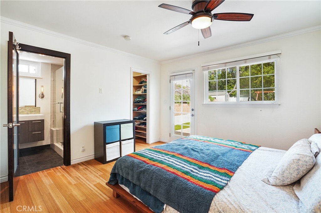 7044 Scarborough Peak Drive West Hills, CA 91307 - Photo 12 of 27 a bedroom with a bed and a table