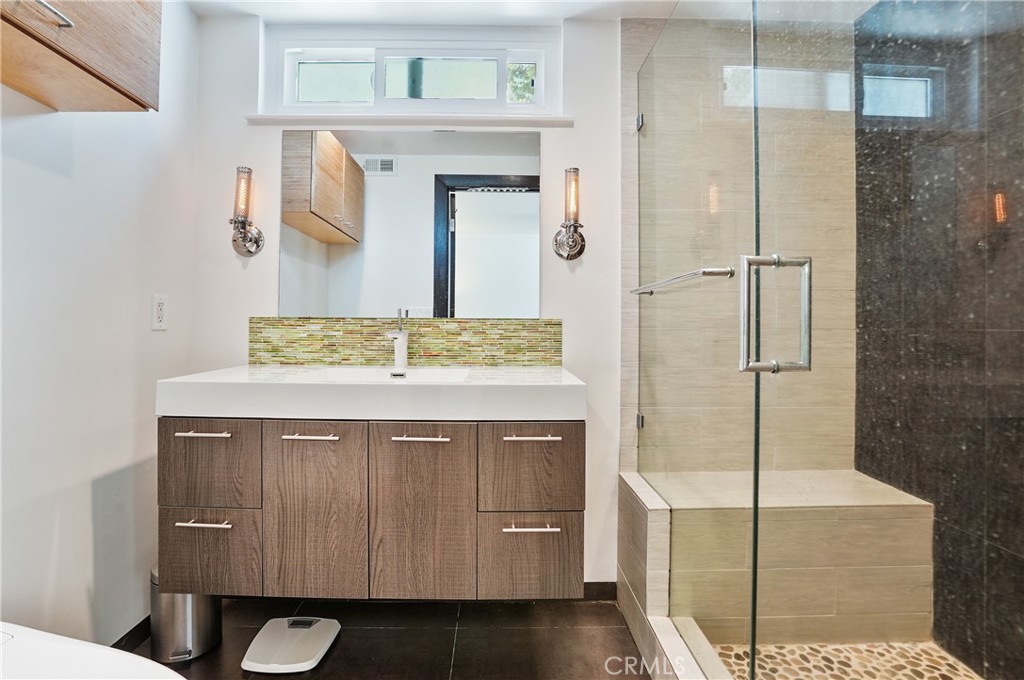 7044 Scarborough Peak Drive West Hills, CA 91307 - Photo 13 of 27 a bathroom with a sink and a mirror