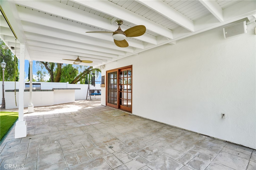 7044 Scarborough Peak Drive West Hills, CA 91307 - Photo 4 of 27 a view of an empty room with a window and kitchen view