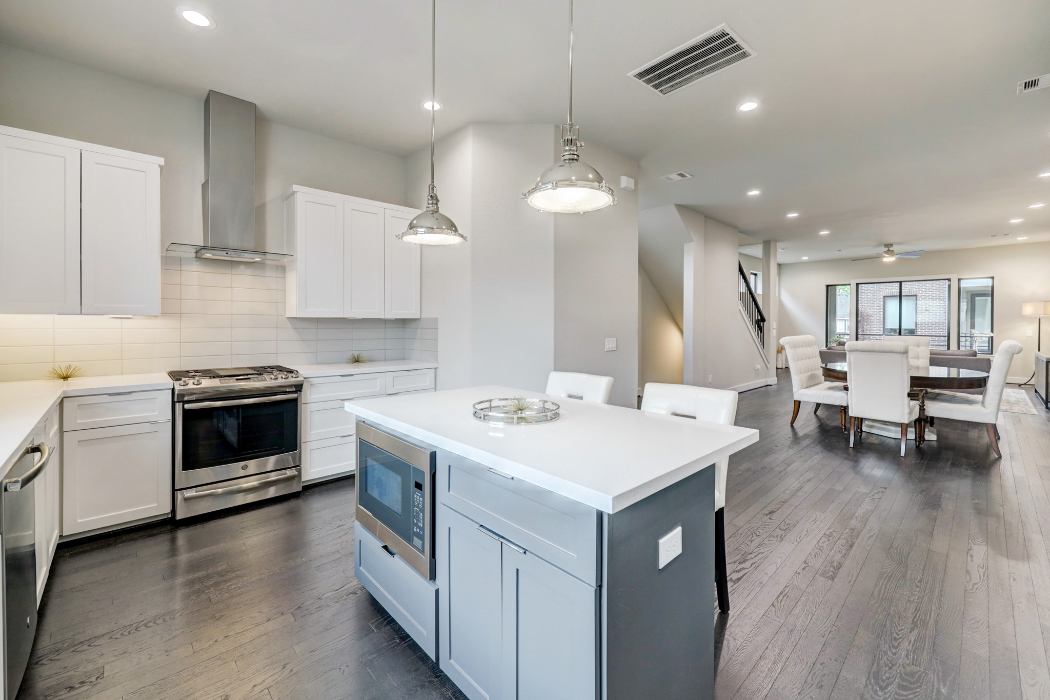 4203 Allen Street Houston, TX 77007 - Photo 18 of 35 a kitchen with a stove and a sink