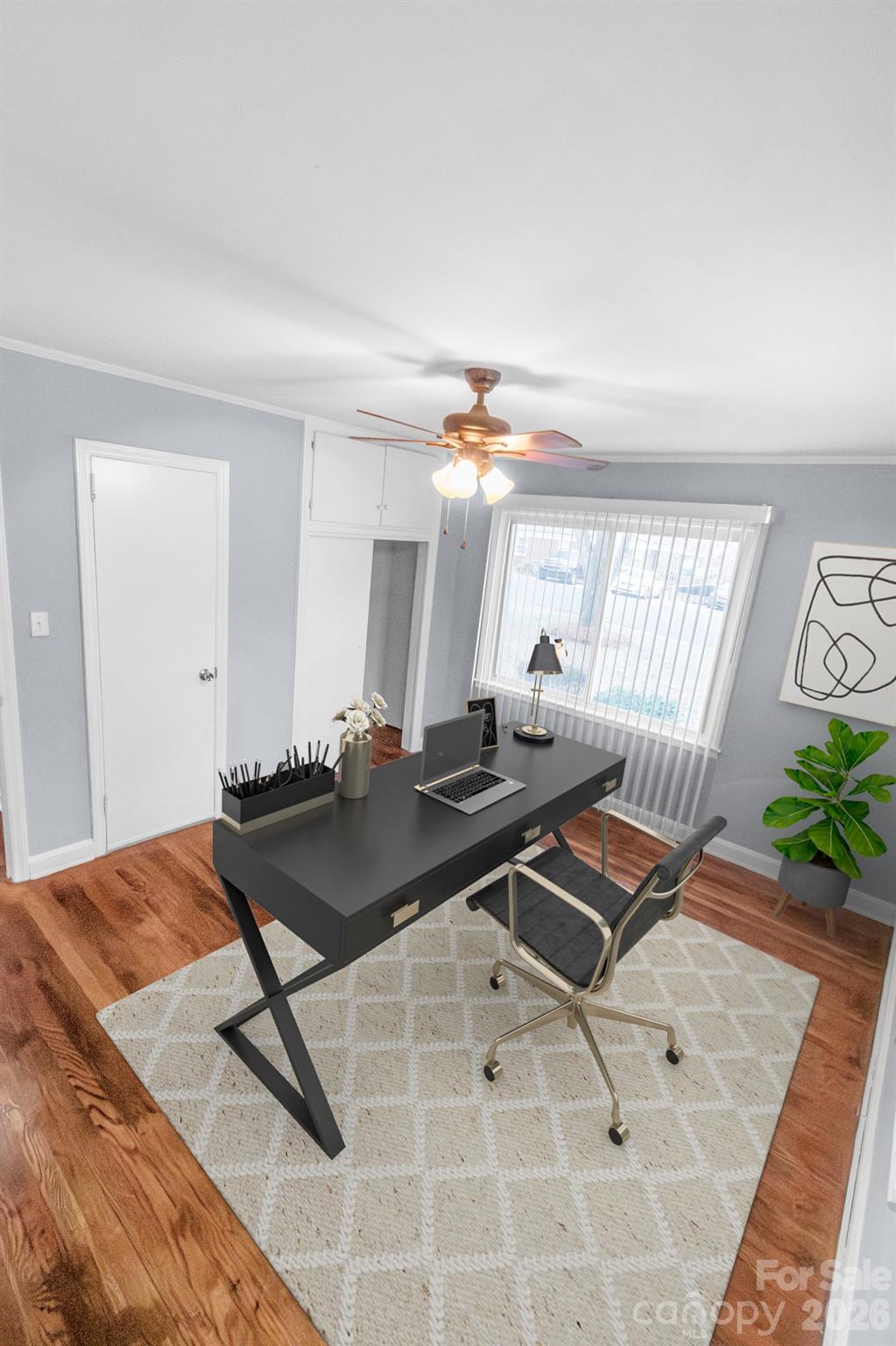 621 Reeves Court Charlotte, NC 28208 - Photo 5 of 11 a living room with a couch and a table