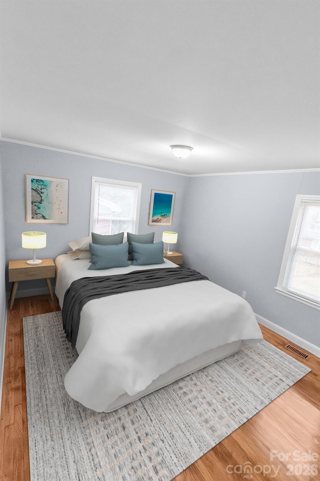 621 Reeves Court Charlotte, NC 28208 - Photo 6 of 11 a bedroom with a bed and a window