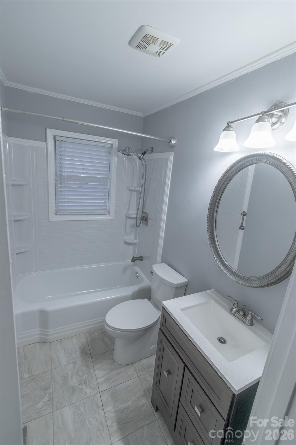 621 Reeves Court Charlotte, NC 28208 - Photo 8 of 11 a bathroom with a sink toilet and shower