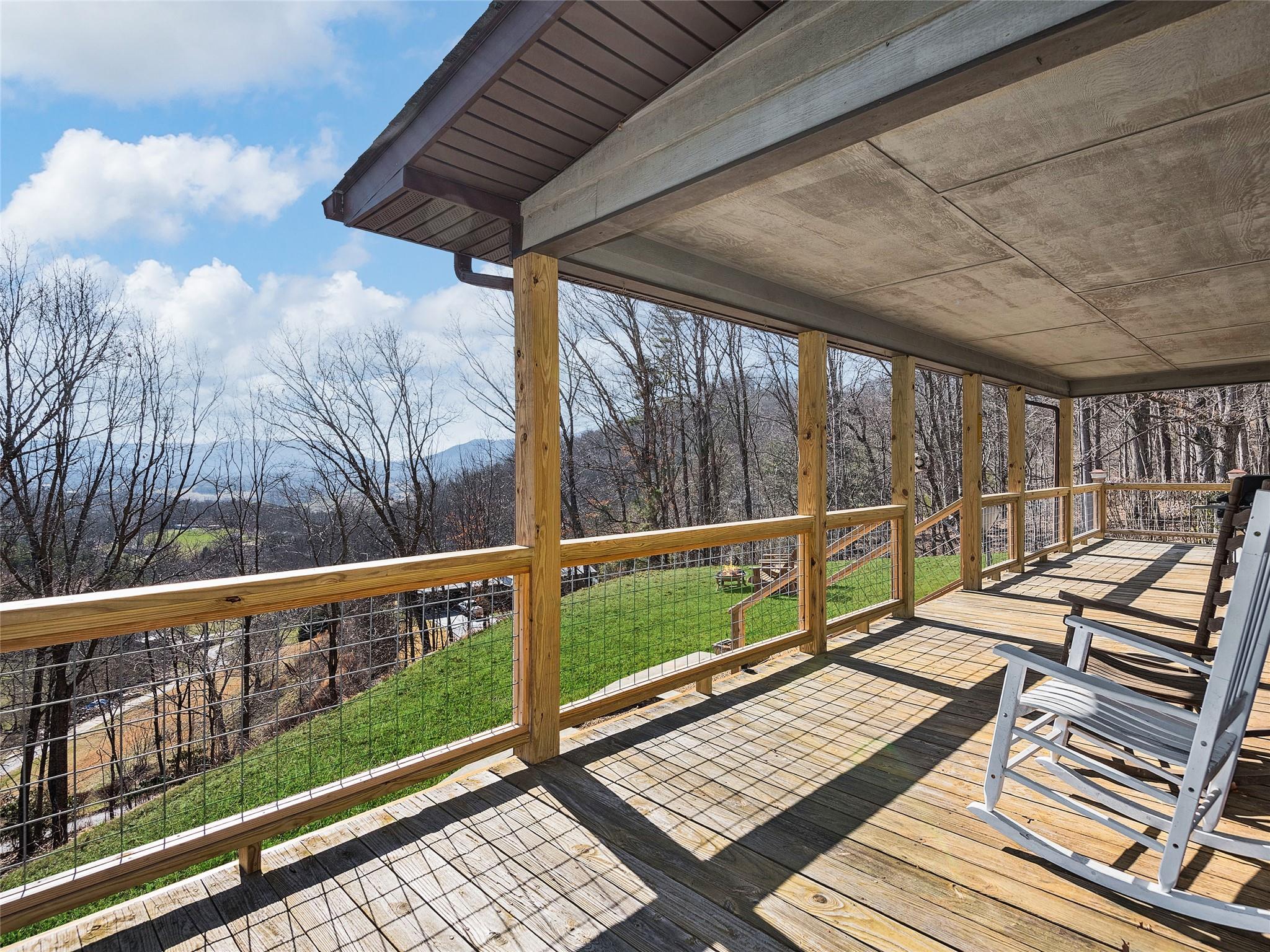 2843 Hyder Mountain Road Clyde, NC 28721 - Photo 3 of 30 a view of balcony with wooden floor