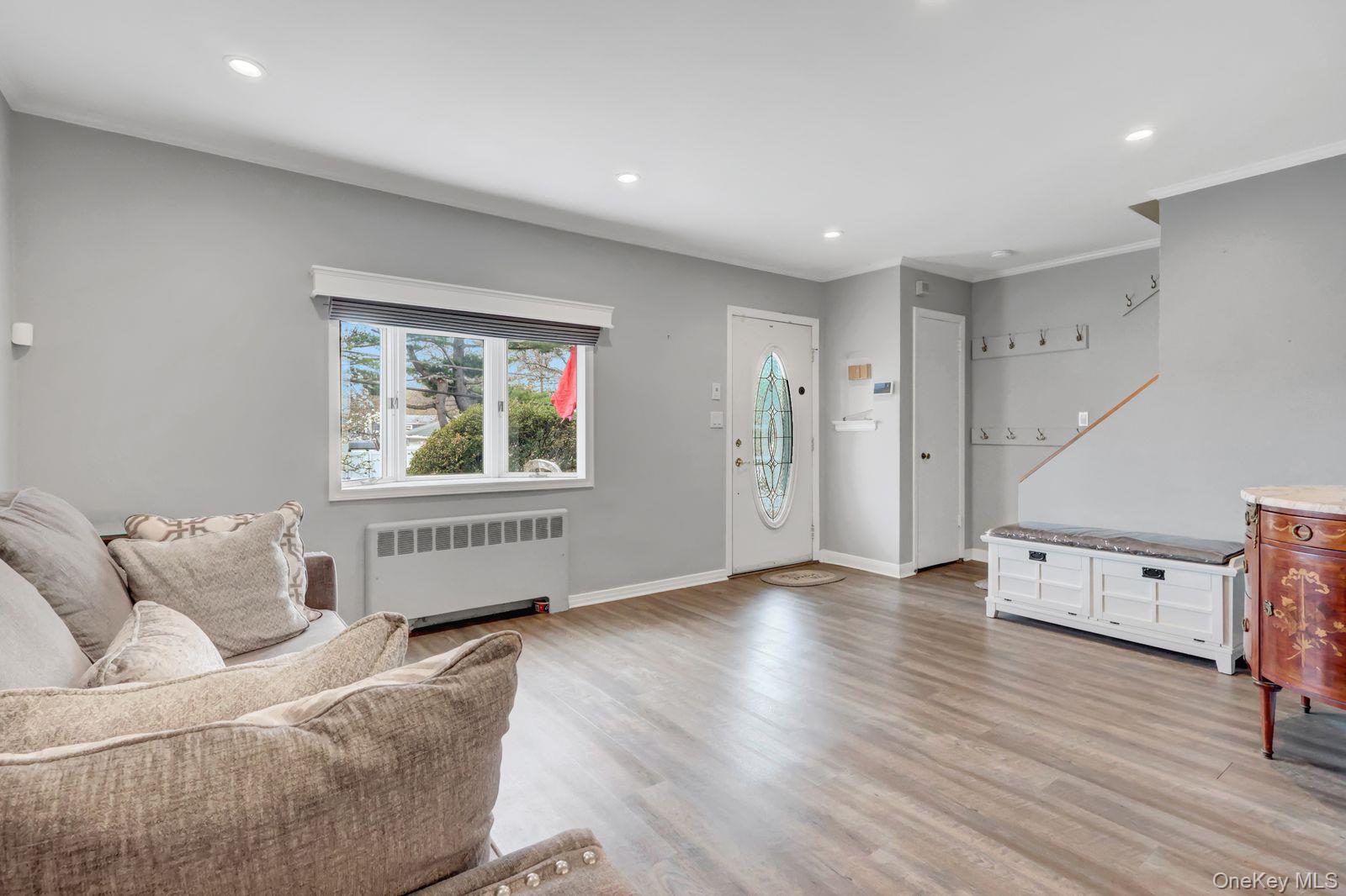 451 North Grove Street Valley Stream, NY 11580 - Photo 11 of 38 a living room with furniture and wooden floor