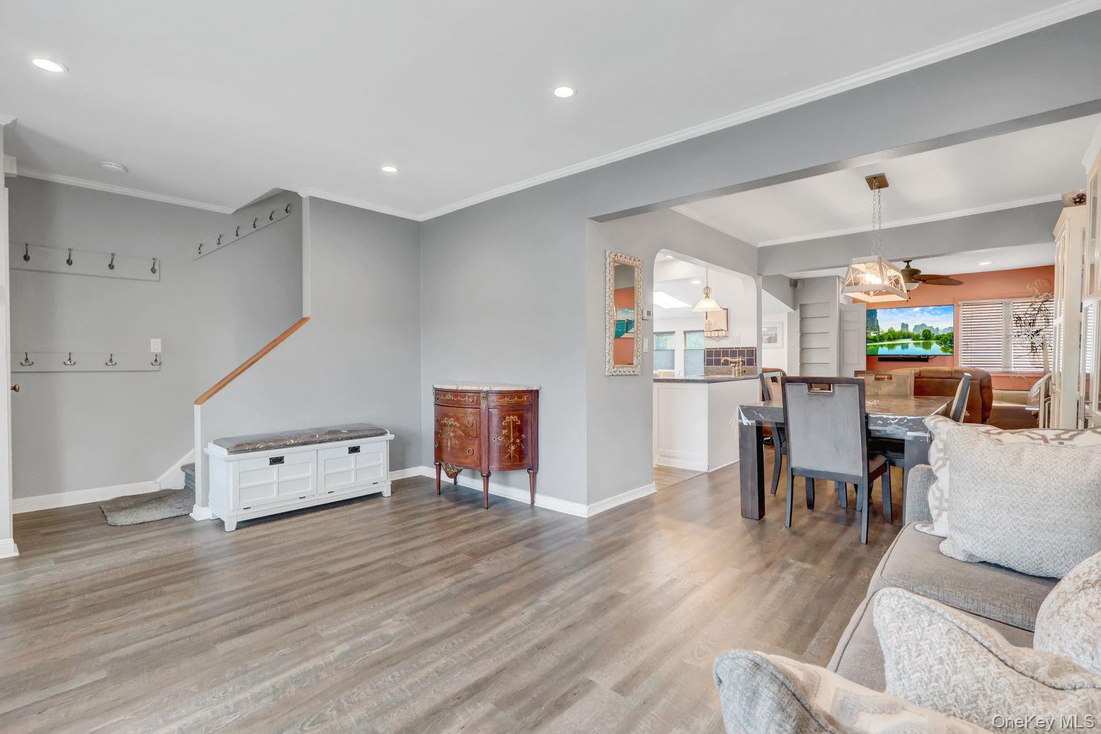 451 North Grove Street Valley Stream, NY 11580 - Photo 13 of 38 a living room with furniture and a wooden floor
