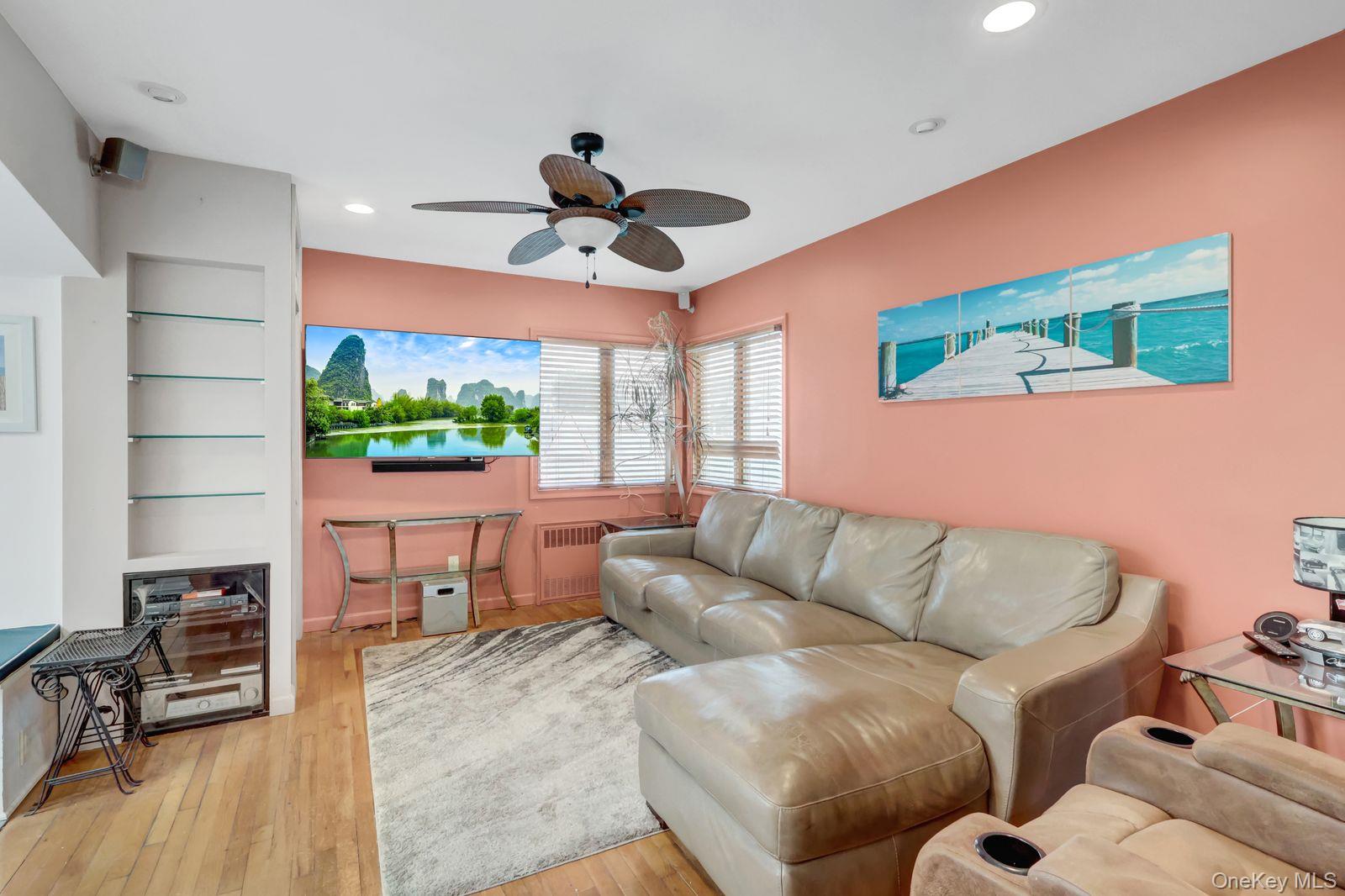 451 North Grove Street Valley Stream, NY 11580 - Photo 21 of 38 a living room with furniture and a large window