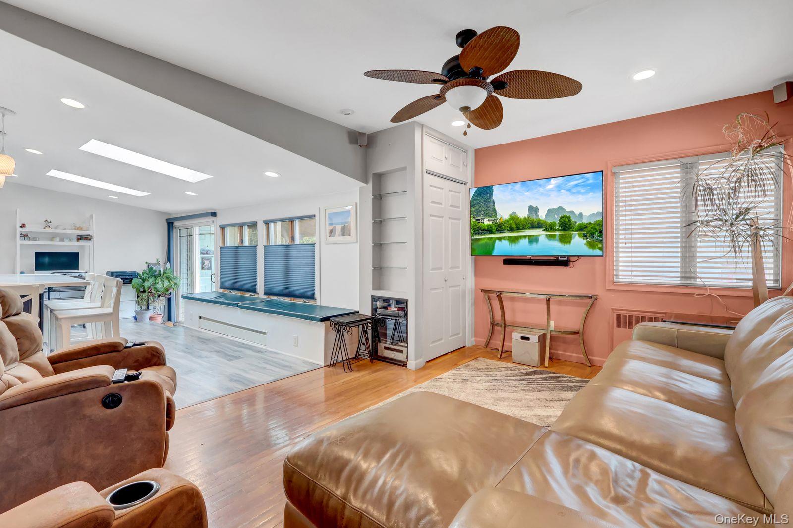 451 North Grove Street Valley Stream, NY 11580 - Photo 23 of 38 a living room with furniture and a large window