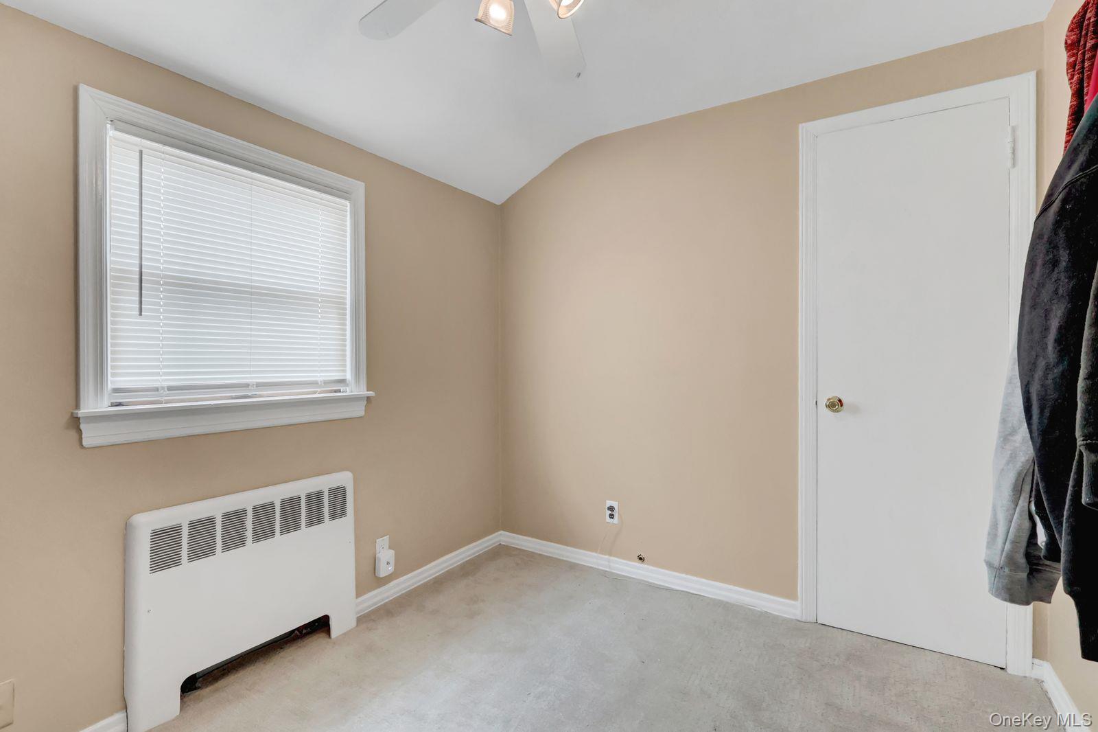 451 North Grove Street Valley Stream, NY 11580 - Photo 26 of 38 an empty room with a window