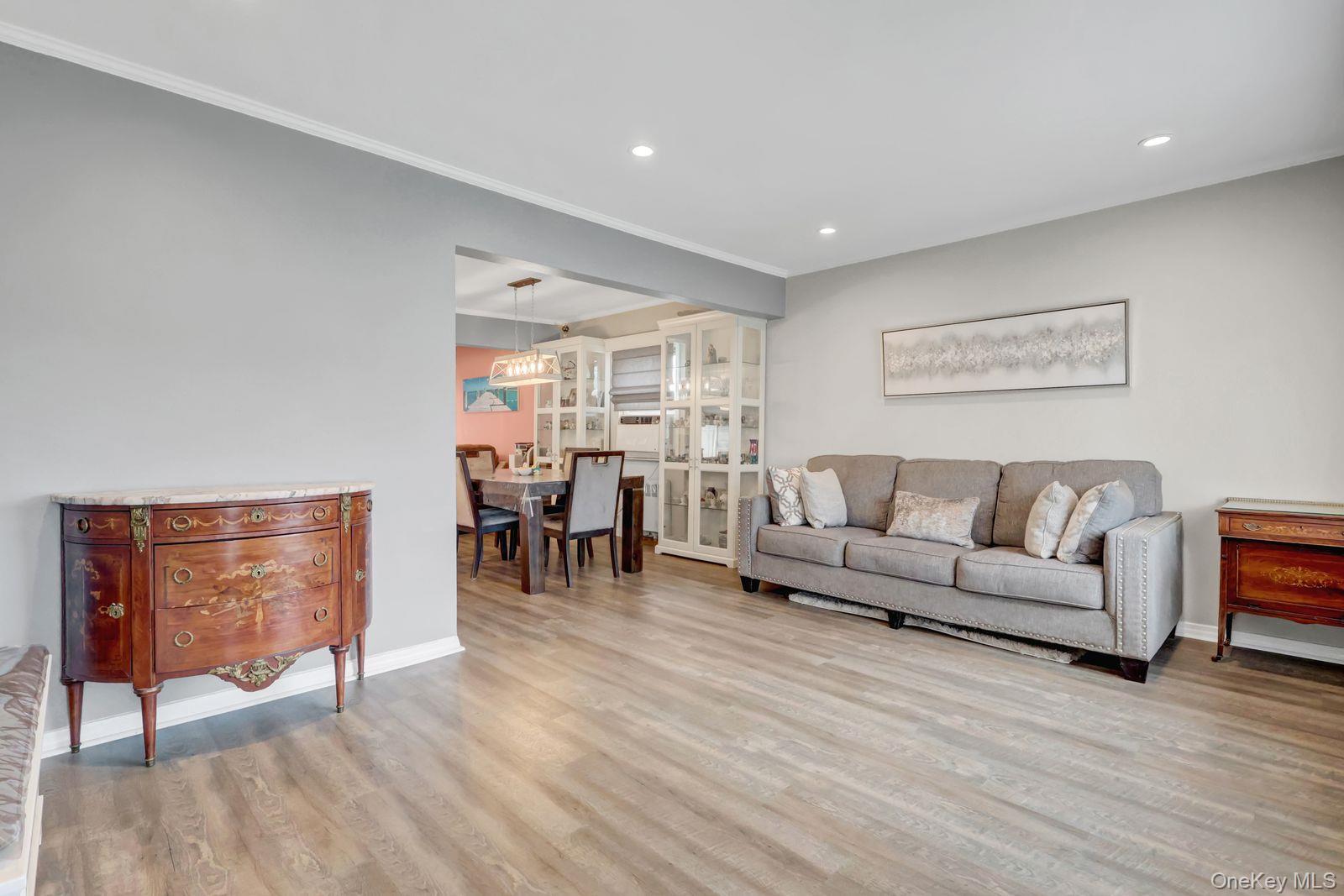 451 North Grove Street Valley Stream, NY 11580 - Photo 10 of 38 a living room with furniture and a wooden floor