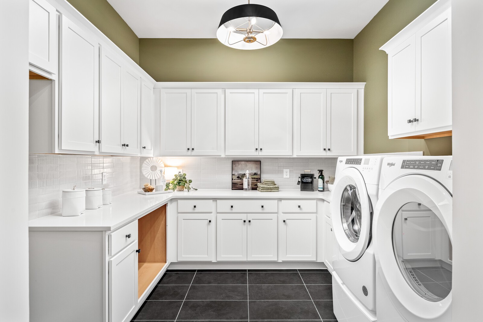 4740 Ash Hill Road Spring Hill, TN 37174 - Photo 15 of 82 a kitchen with stainless steel appliances granite countertop a sink and cabinets