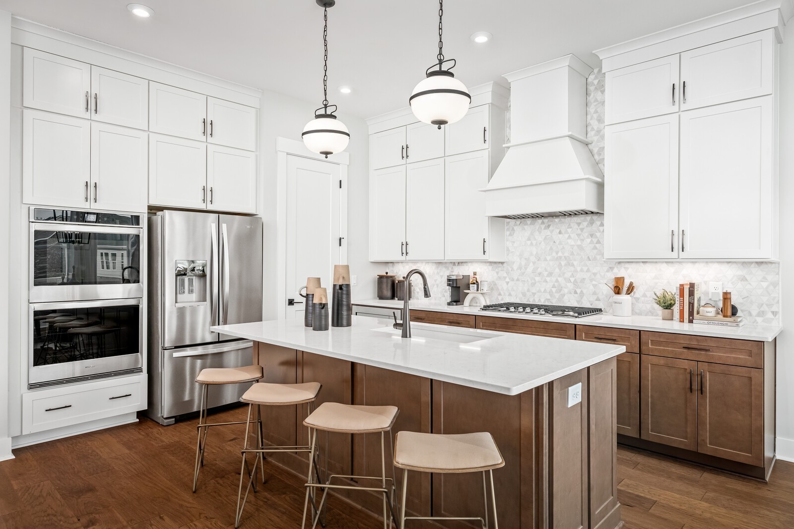 4740 Ash Hill Road Spring Hill, TN 37174 - Photo 25 of 82 a kitchen with stainless steel appliances a stove a sink island and cabinets