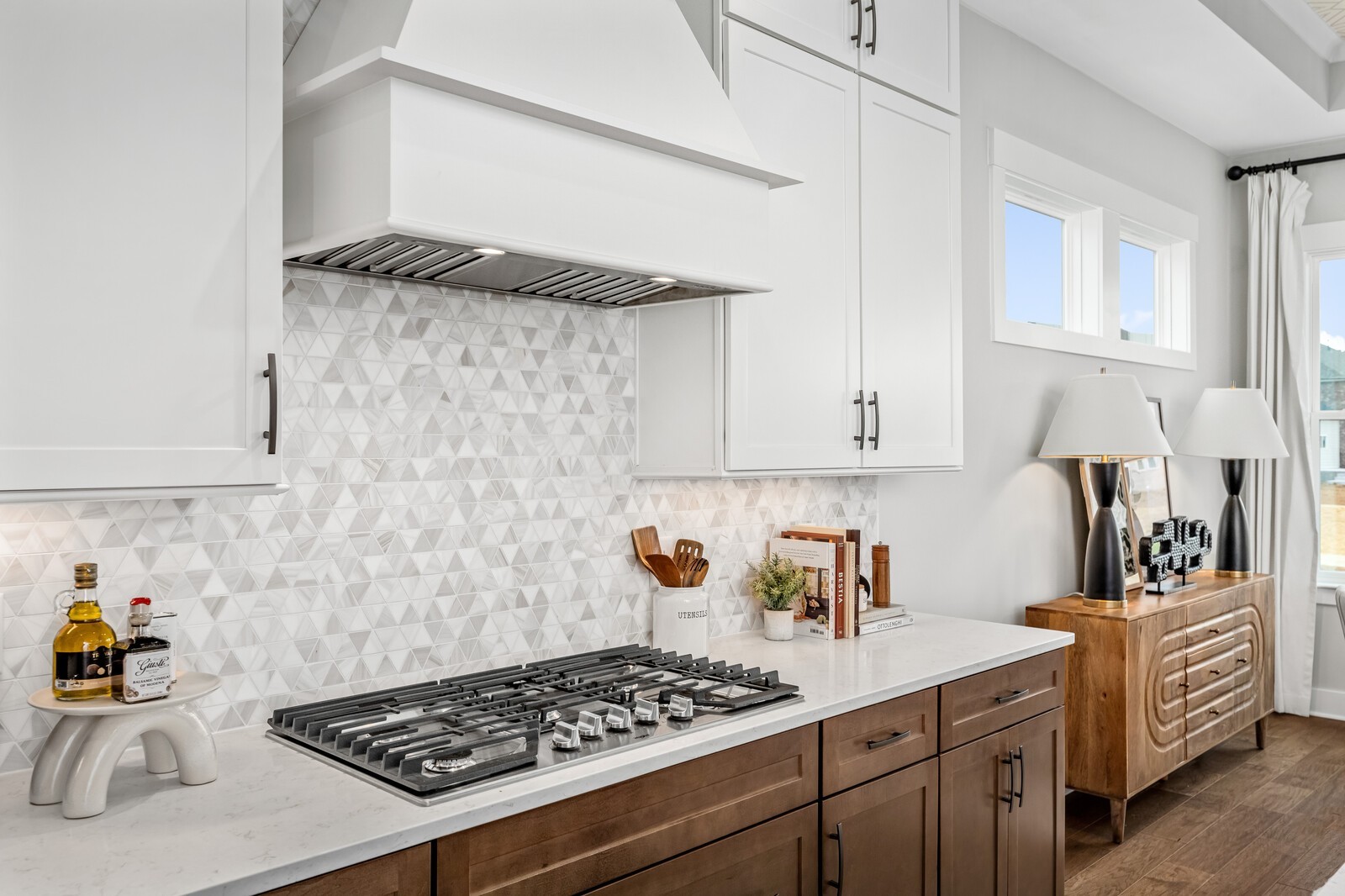 4740 Ash Hill Road Spring Hill, TN 37174 - Photo 27 of 82 a kitchen with stainless steel appliances a stove a sink and cabinets