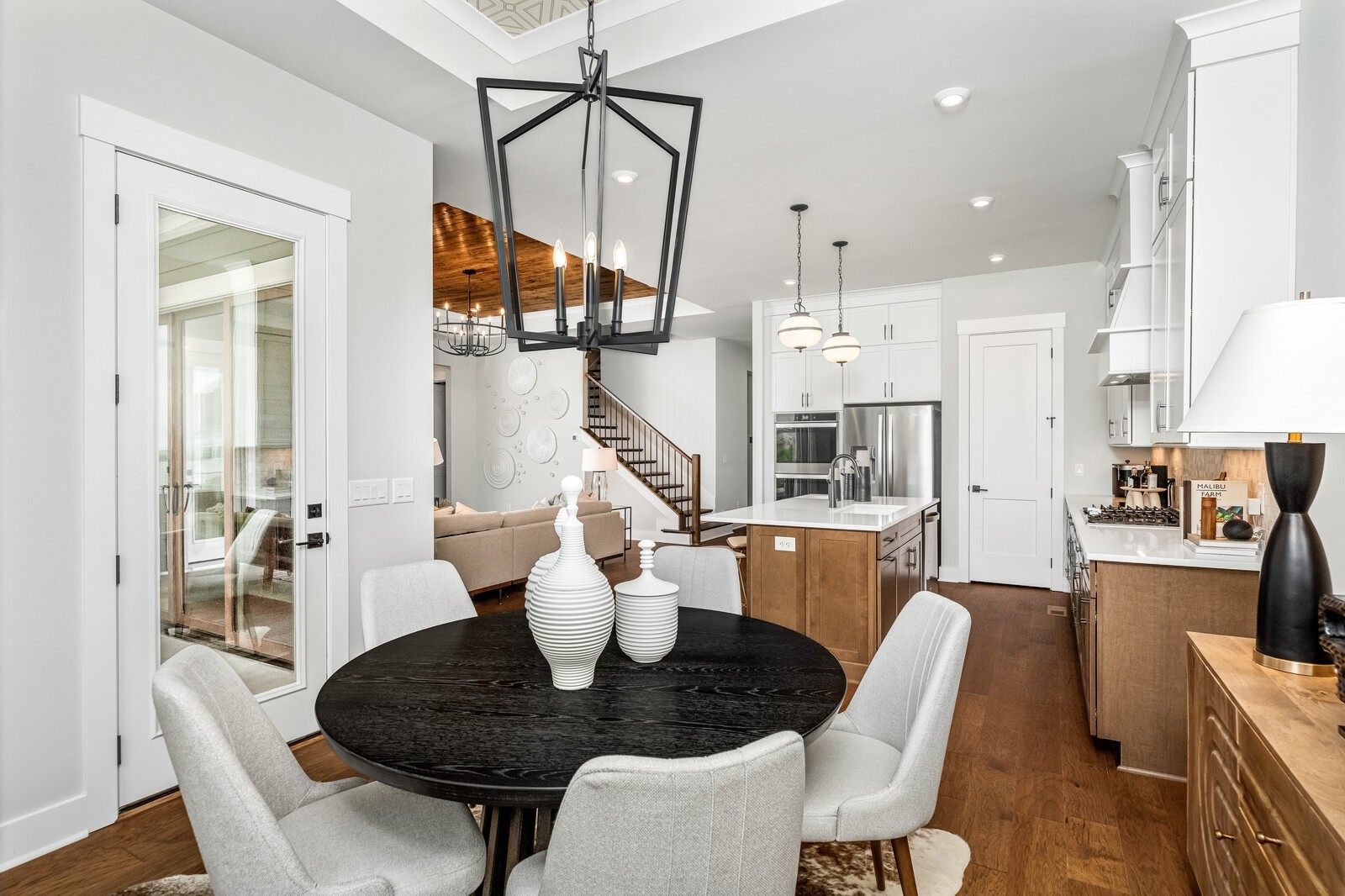 4740 Ash Hill Road Spring Hill, TN 37174 - Photo 29 of 82 a dining room with furniture and wooden floor