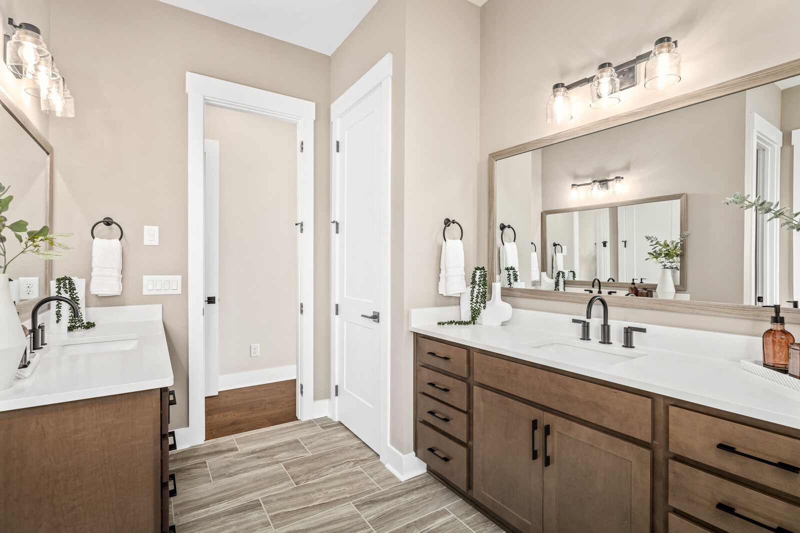 4740 Ash Hill Road Spring Hill, TN 37174 - Photo 35 of 82 a bathroom with a double vanity sink mirror and next to a window