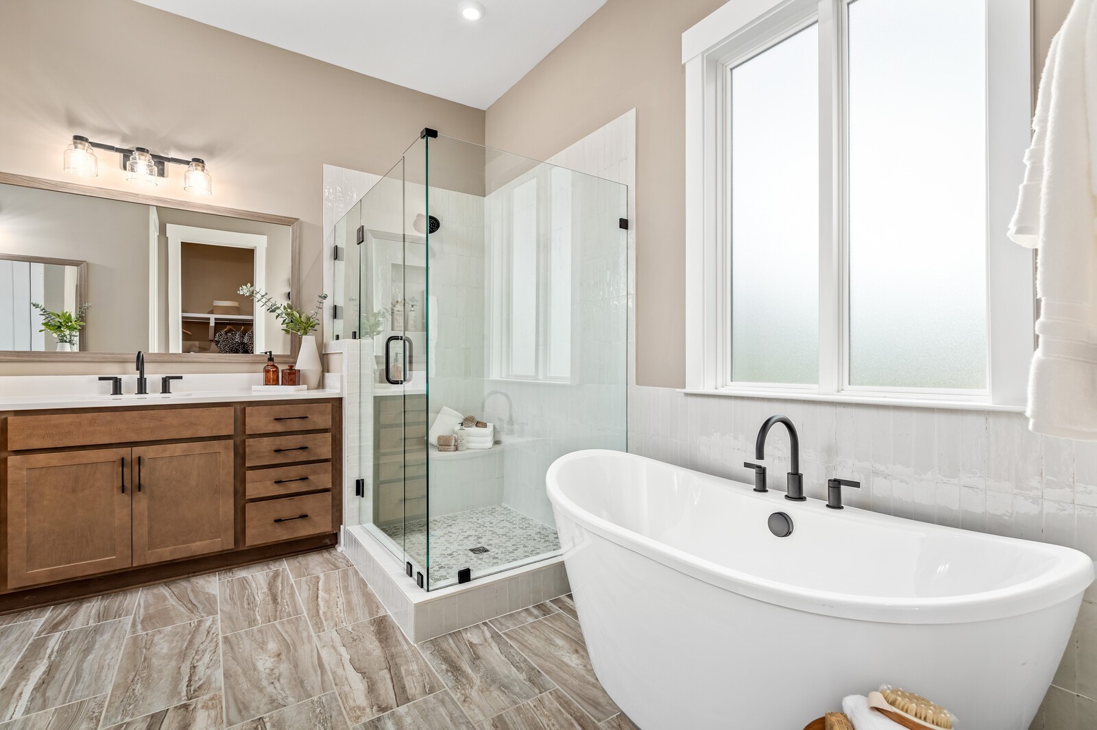 4740 Ash Hill Road Spring Hill, TN 37174 - Photo 38 of 82 a white bath tub sitting next to a bathroom sink