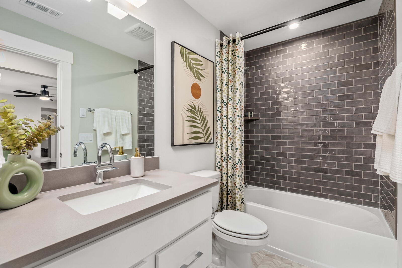 4740 Ash Hill Road Spring Hill, TN 37174 - Photo 51 of 82 a bathroom with a sink a toilet and shower