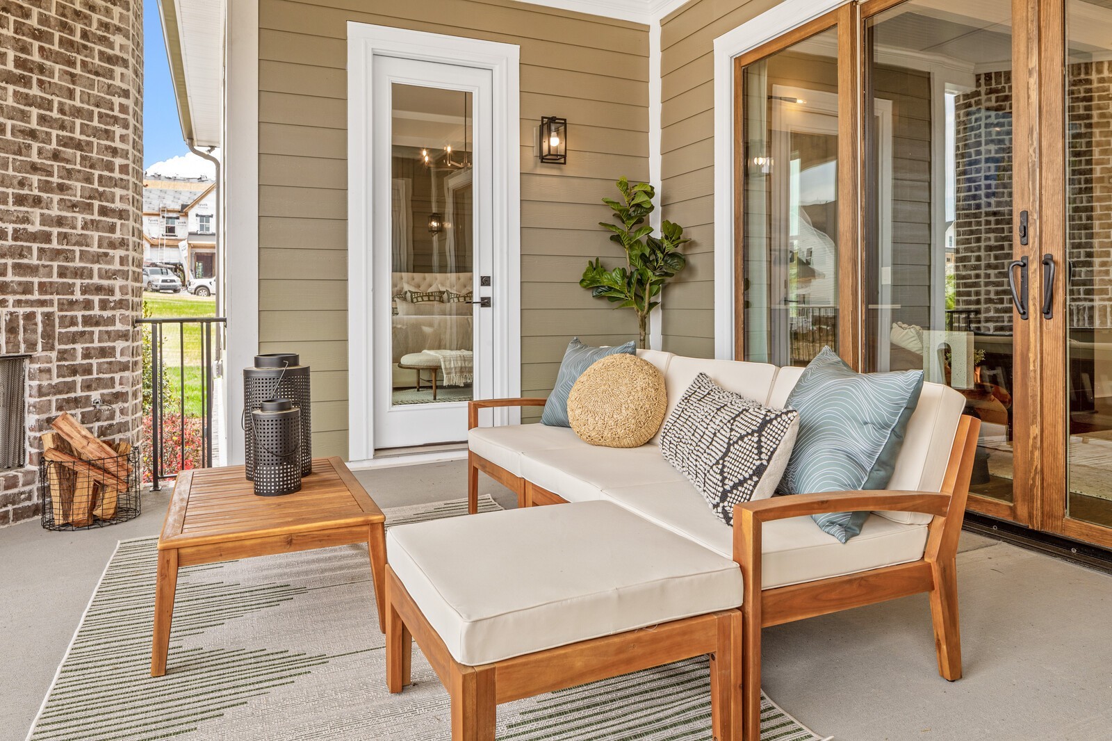 4740 Ash Hill Road Spring Hill, TN 37174 - Photo 53 of 82 a view of a patio with table and chairs and potted plants
