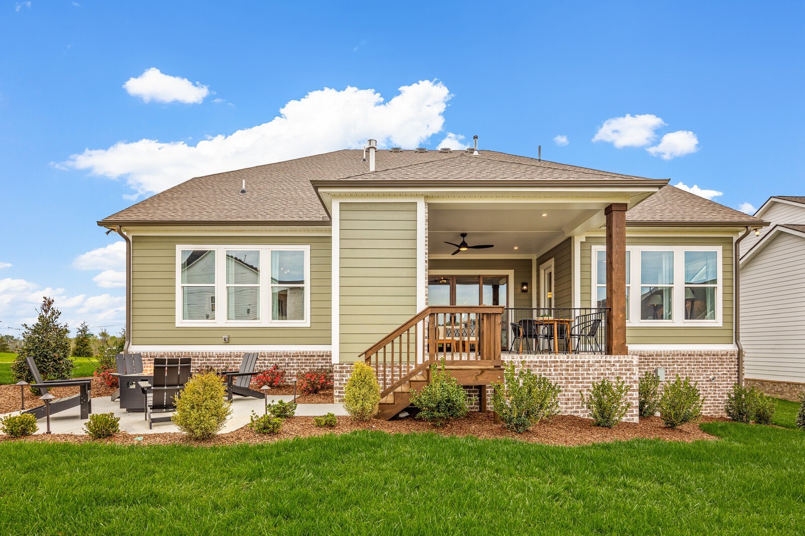 4740 Ash Hill Road Spring Hill, TN 37174 - Photo 54 of 82 a front view of a house with a yard and outdoor seating