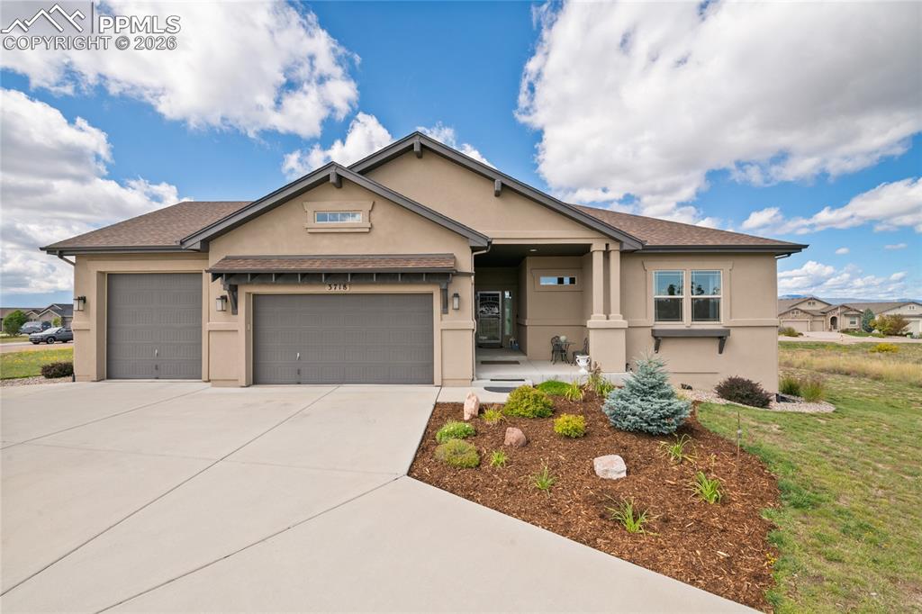 3718 Sky Rim Court Colorado Springs, CO 80908 - Photo 1 of 49 Front of home faces East.