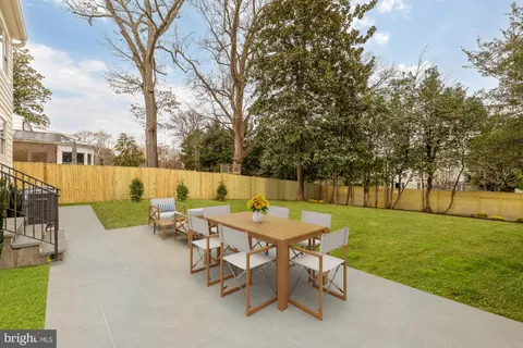 a view of a patio with a yard