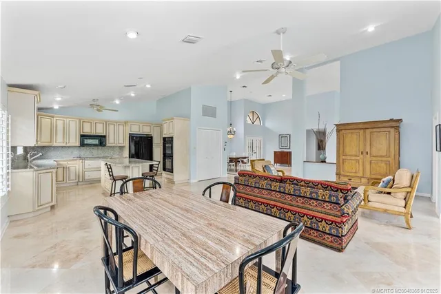 a outdoor space with furniture and a flat screen tv